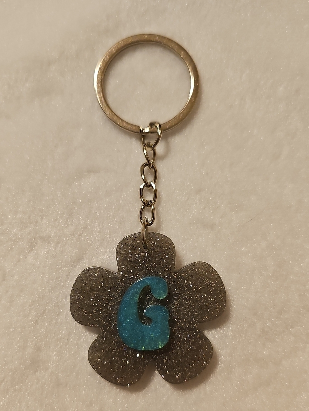 Silver Glitter Flower Initial G Keychain